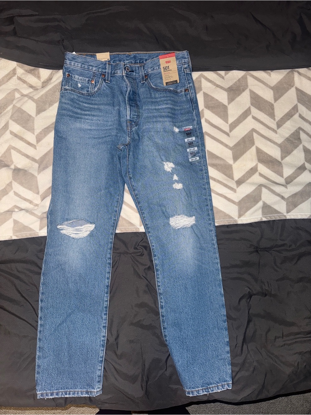 Levi's Men's Light Blue Ripped Straight Jeans